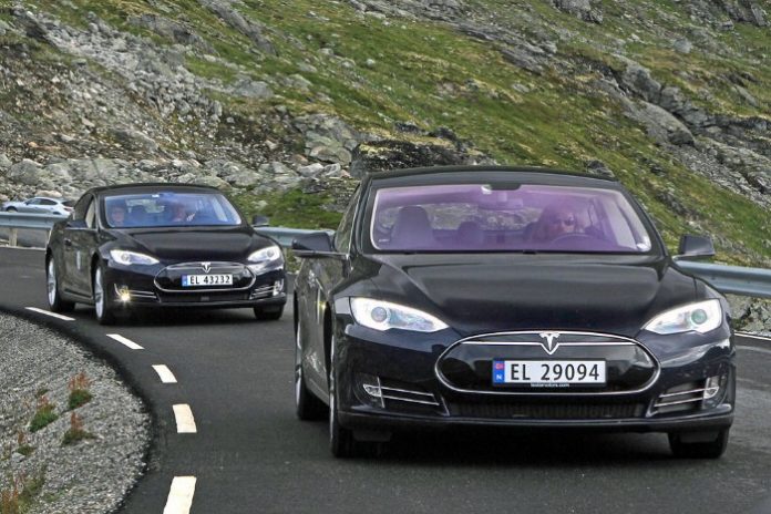 Two Tesla Model S vehicles driving in Norway